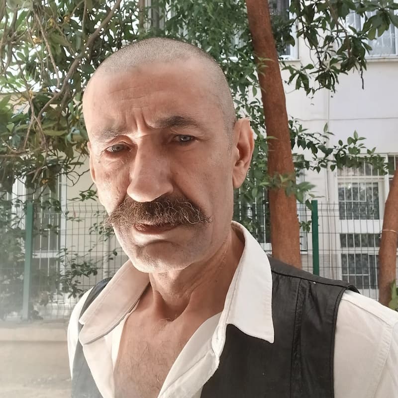 Небил Сайин
